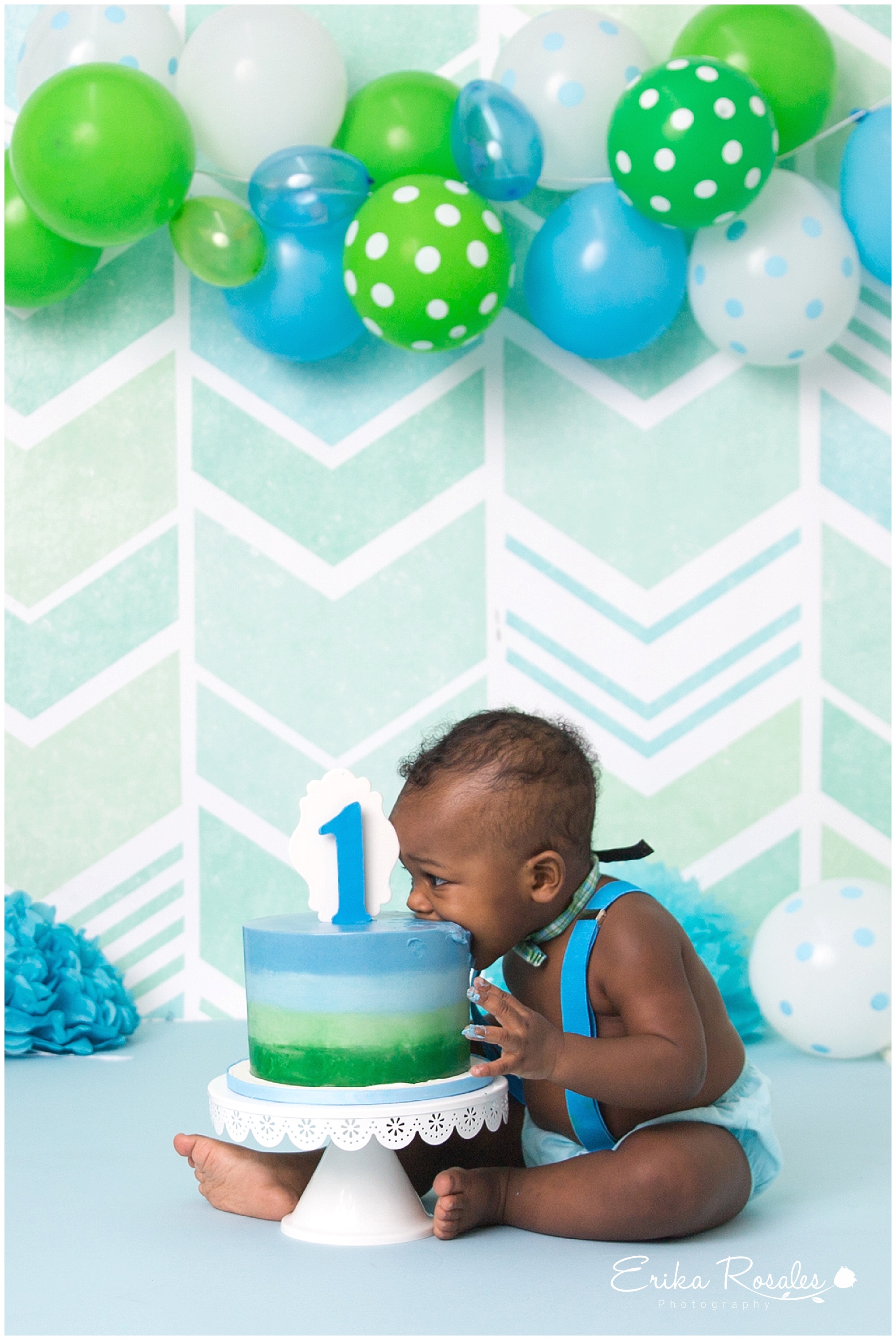 Baby boy playing with a cake during cake smash birthday party Stock Photo -  Alamy